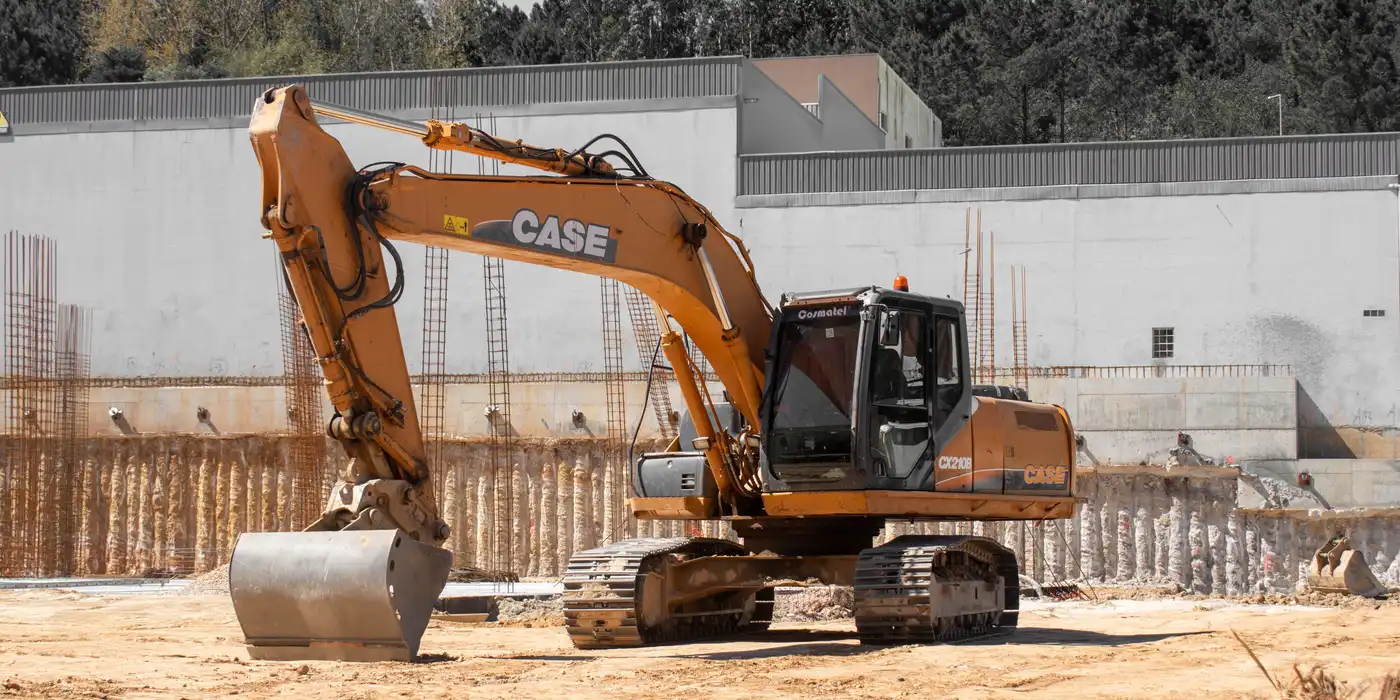 Excavation skid steer working on a job site in Louisville